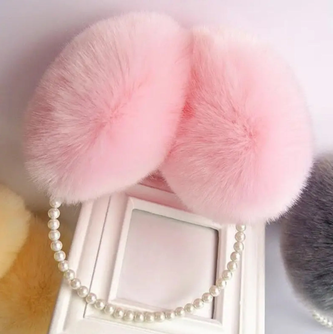 Pink fluffy earmuffs